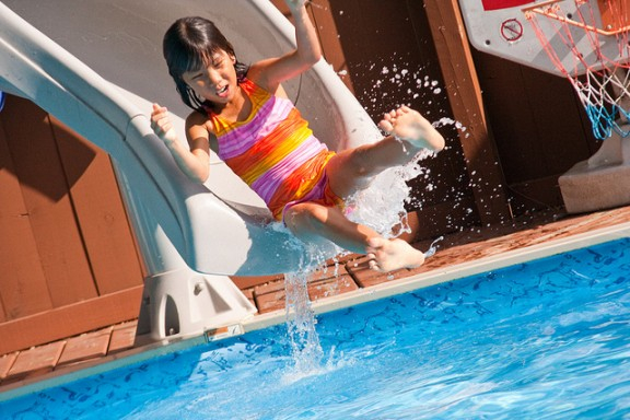 girl-on-slide-by-steven-depolo-via-flickr-576x384.jpg