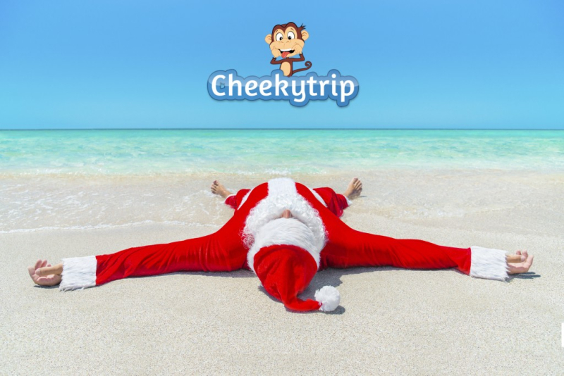 Santa Claus take pleasure sunbathing at tropical ocean beach, Christmas and New Year's vacation in hot countries concept